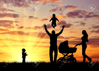 48318864-silhouette-of-a-happy-family-with-children-on-the-background-of-a-sunset
